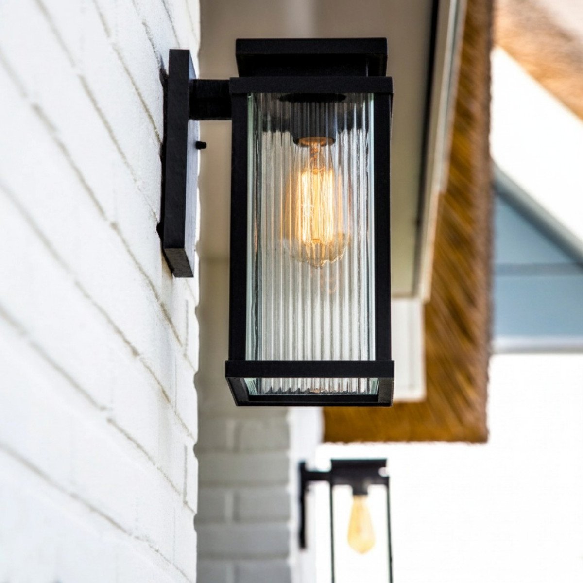 Lampe extérieure Ripley applique murale noire verre strié